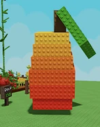 Player holding giant overgrown mango
